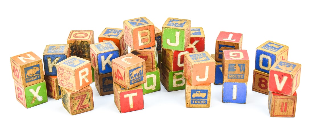 SET OF 34 WOODEN ALPHABET BLOCKS: These primitive, embossed alphabet blocks have letters, numbers, mathematical symbols, objects, animals, and fairytale characters across their six sides. Thirty two of them belong to the same set mean