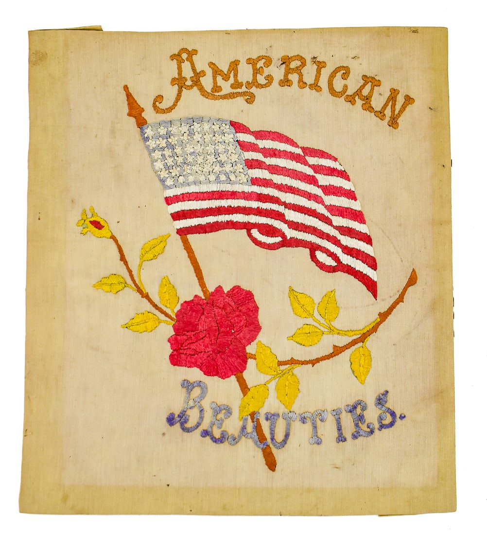 RICHARDSON SILK COMPANY "AMERICAN BEAUTIES" ROSE SERIES HAND EMBROIDERY: A Richardson Silk Company "American Beauty" Rose series embroidery "No. 830 American Beauties with Flag", from the early 20th century. The item measures approx. 17" H x 15" W x 0.5" D.