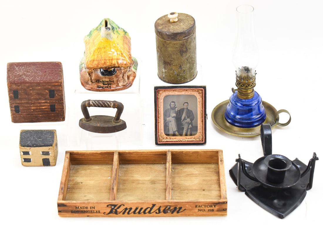 ANTIQUE GLOBAL TRINKET ASSORTMENT: This lot consists of nine trinkets that were collected on travels: A Knudsen cream cheese wooden box tray from Los Angeles, California, circa 1910. A "Little Duchess" miniature kerosene