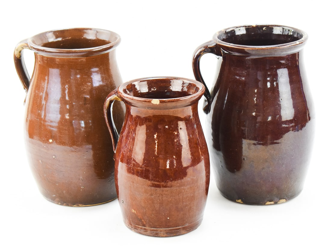 THREE ASSORTED BROWN STONEWARE PITCHERS - 2