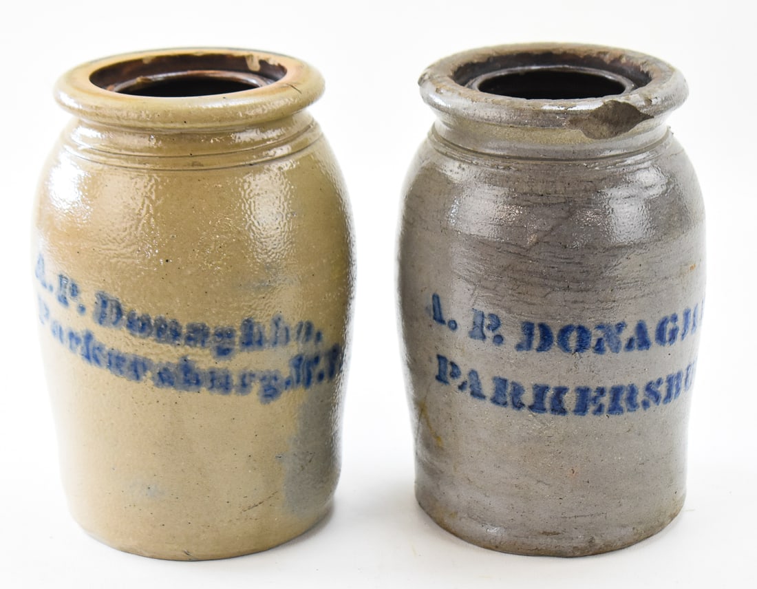 TWO A.P. DONAGHHO STONEWARE WAX SEALER JARS: This lot includes two marked A.P. Donaghho (Parkersburg, W.VA) stoneware wax sealer jars, from the late 19th century. Each jar measures approx. 8.5" H x 5.5" W x 5.5" D.