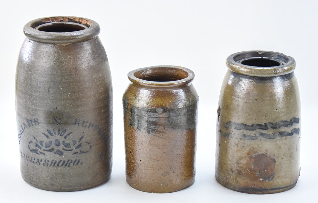 THREE STONEWARE JARS: WILLIAMS & REPPERT: This lot includes a marked Williams & Reppert (Greensboro, PA) stoneware jar and two unmarked stoneware jars, from the late 19th century. The largest item measures approx. 11" H x 6" W x 6" D.