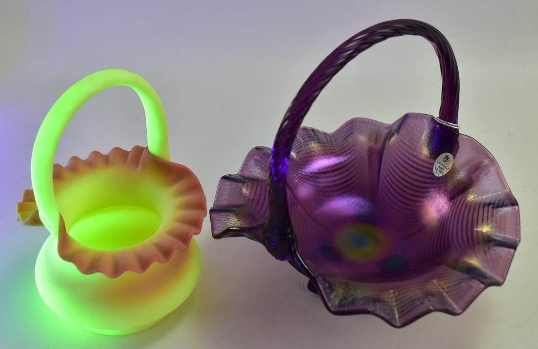 PAIR OF FENTON ART GLASS BASKETS: AMETHYST CARNIVAL GLASS AND BURMESE GLASS (1 of 4)