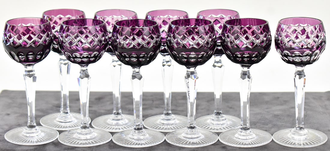 TEN BOHEMIAN CUT-TO-CLEAR WINE HOCK CORDIALS: This lot includes ten Bohemian cut-to-clear wine hock cordials with a cross hatch diamond pattern. Each glass measures approx. 5" H x 2" W x 2" D.