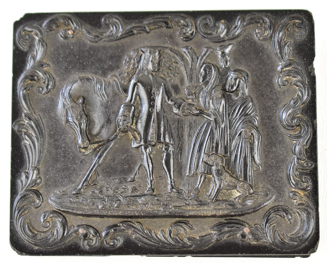 DAGEURREOTYPE UNION CASE; A.P. CRITCHLOW & COMPANY: An A.P. Critchlow & Company (Florence, MA) Union Case in "The Gypsy Fortune Teller" pattern and is a 1/4 plate size, circa 1857. The case measures approximately 4" H x 5" W x 1