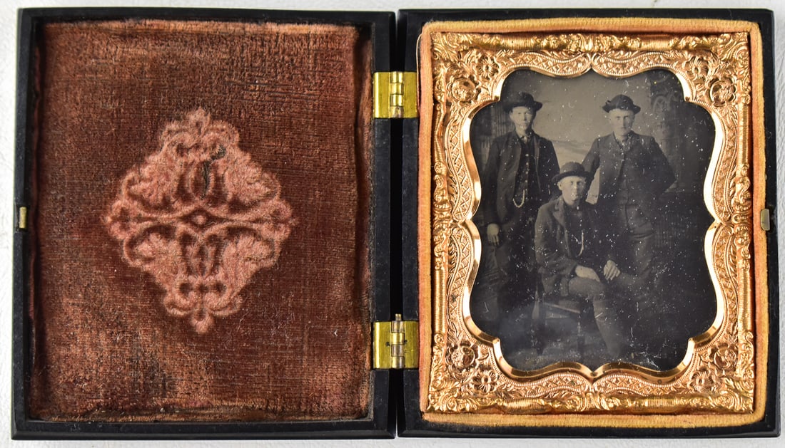 3 MEN TINTYPE: This tintype has a trio of men inside a 1/6 Union case with a brown lining. When closed the case measures approximately 4" H x 3" W x 1" D.