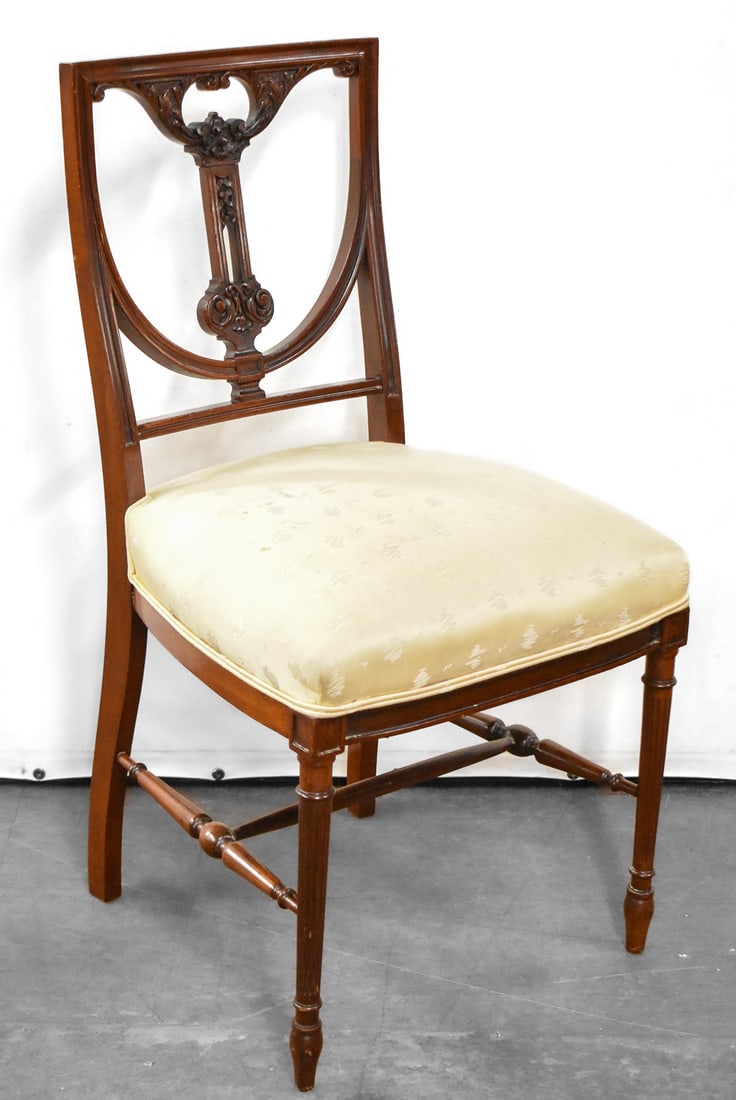 EDWARDIAN STYLE MAHOGANY SHIELD BACK SIDE CHAIR: Chair is made of mahogany circa 1920s. It has a newer upholstery. Chair measures approximately 33.5" H x 18" W x 17" D.
