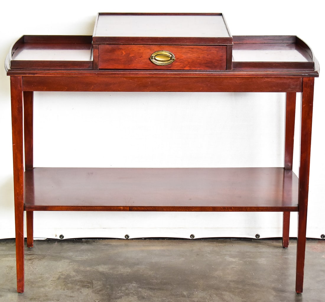 MERSMAN MAHOGANY THREE TEIR CONSOLE TABLE: The Mersman logo can be found under the center drawer. It is made of solid mahogany with a felt lined drawer circa the 1970s. It measures approximately 29" H x 28.5" W x 14.5" D.
