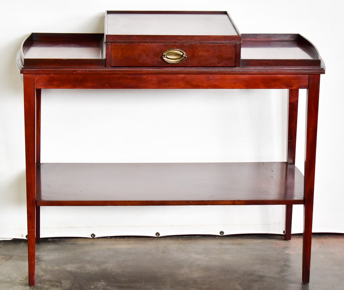 MERSMAN MAHOGANY THREE TEIR CONSOLE TABLE: The Mersman logo can be found under the center drawer. It is made of solid mahogany with a felt lined drawer circa the 1970s. It measures approximately 29" H x 28.5" W x 14.5" D.