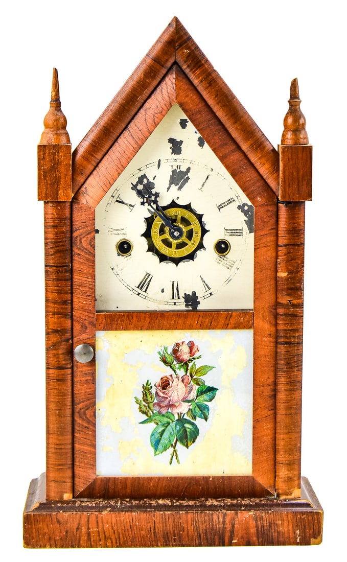STEEPLE MANTEL SHELF CLOCK, WATERBURY CLOCK COMPANY, 19TH CENTURY: A steeple mantel shelf clock with a spring driven time and strike movement with an alarm mechanism, made by the Waterbury Clock Company of Waterbury, Connecticut in the mid-late 19th century. The