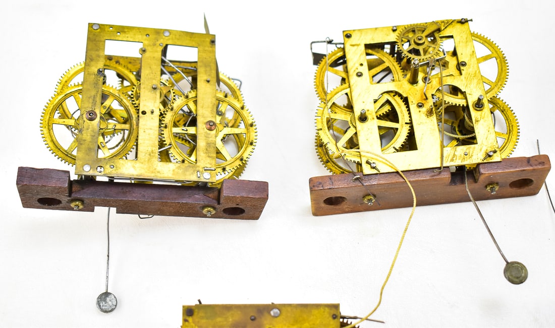 FIVE BRASS CLOCK MOVEMENTS - 2