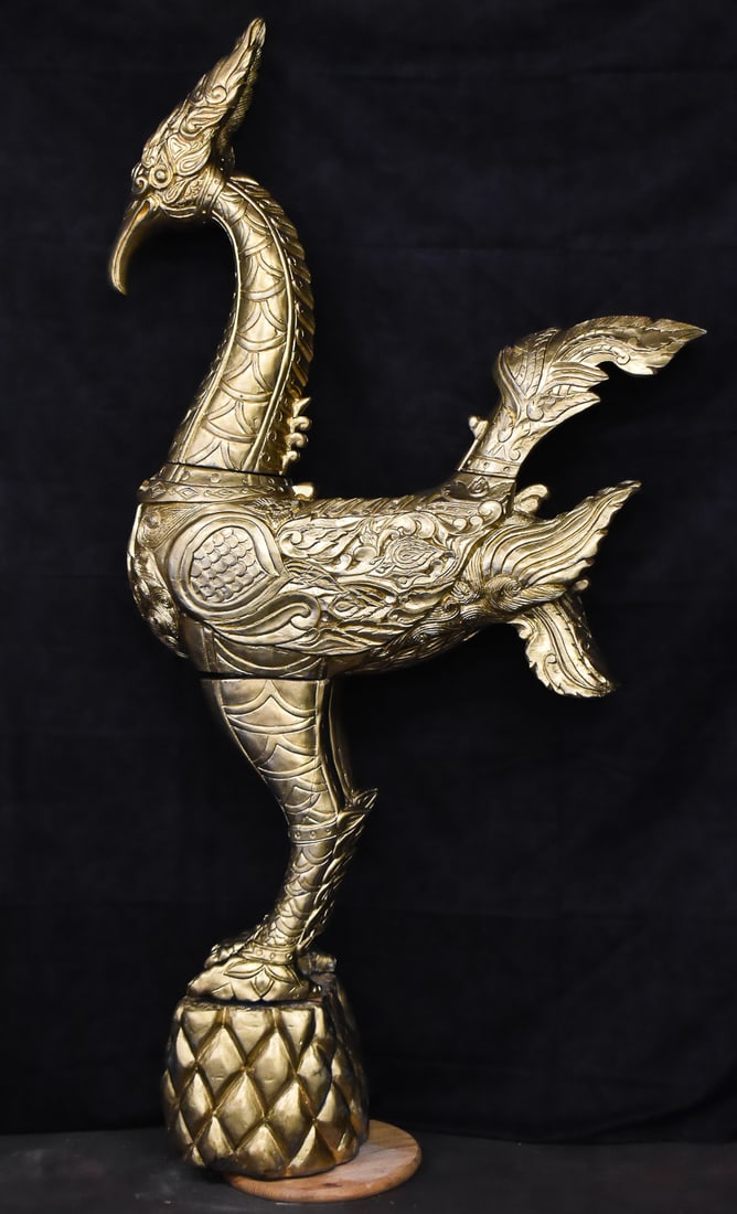 GILTWOOD LARGE TEMPLE SCULPTURE OF A HONGSA, THAILAND: A large giltwood temple sculpture of a Hongsa, originating from Central Thailand, 20th century. This sculpture is hand-carved with traditional Thai craftsmanship with the head having a sweeping