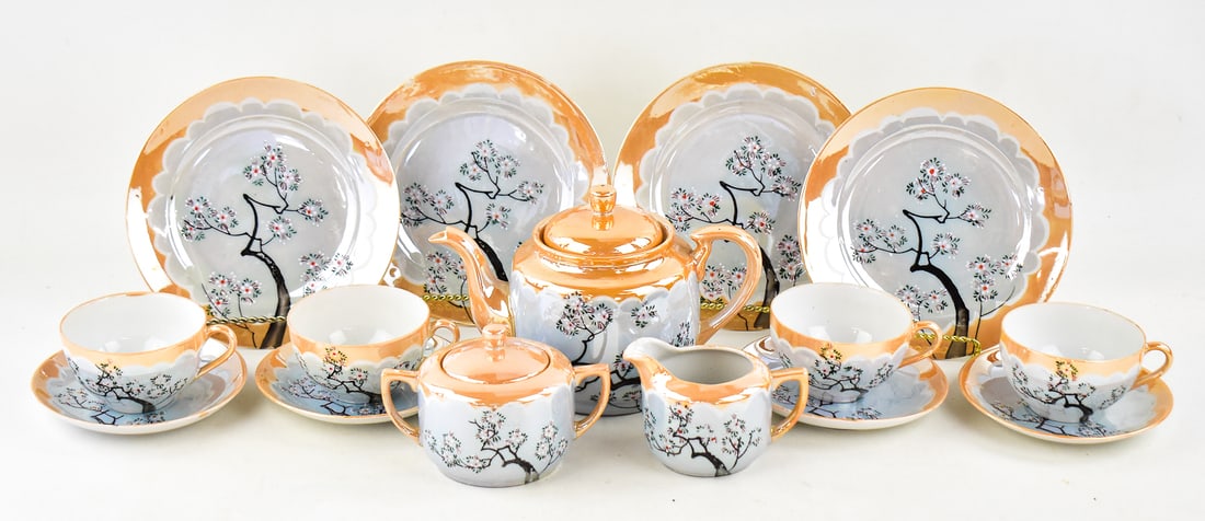 JAPANESE LUSTERWARE LUNCHEON SET: This set consists of four teacups, four saucers, four large plates, creamer, sugar dish and teapot. All items are marked "Made in Japan" underneath. The teapot measures approx. 6" H x 8.5" W x 5" D.