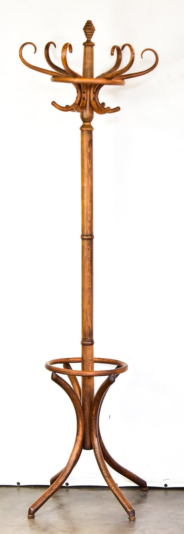BENTWOOD COAT RACK: This coat rack is made from beechwood. Wood was bent into shape by using extremely hot steam and bending it slowly. he top section unscrews for transportation needs. When fully assembled the rack
