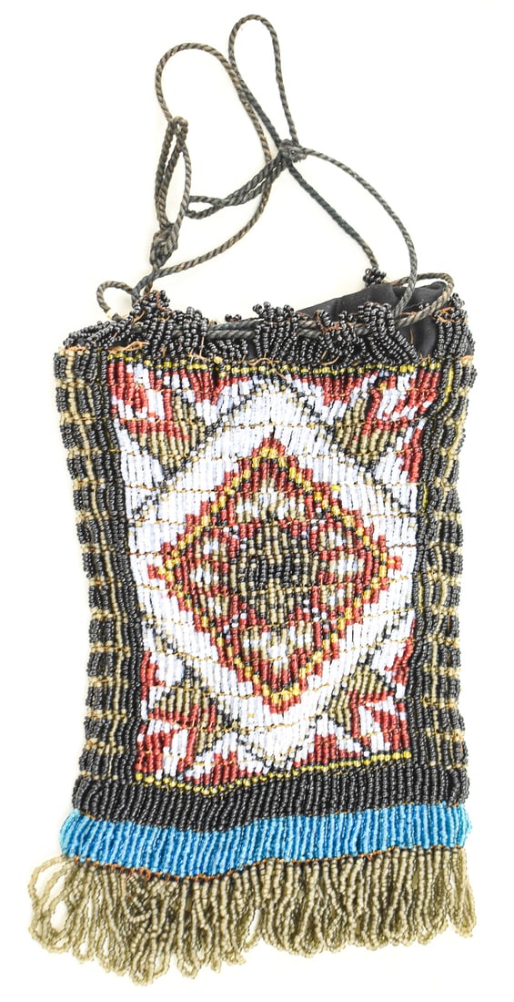 VICTORIAN MICRO-BEADED DRAWSTRING PURSE: A Victorian micro-beaded drawstring purse in a geometric pattern and with a small pocket sewn into it, circa 1900s. The item measures approximately 8.5" H x 6" W x .5" D.