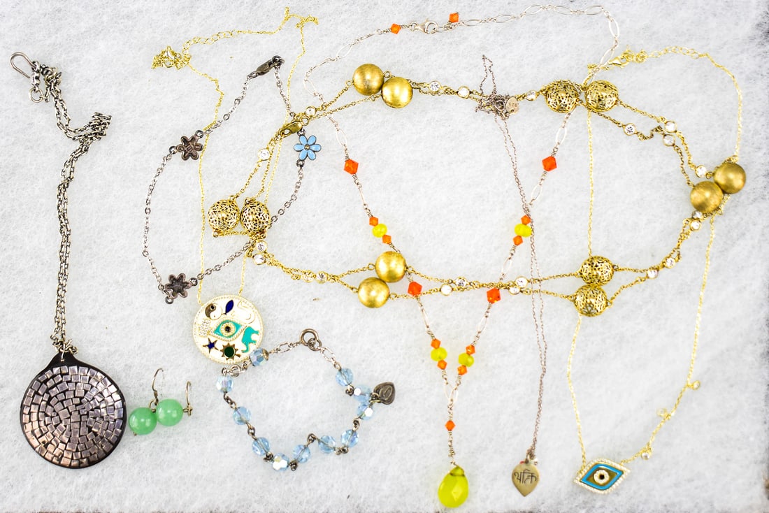 STERLING SILVER JEWELRY ASSORTMENT; EARRINGS, BRACELETS, ETC: This assortment has nine pieces of sterling jewelry weighing approximately 68 grams. Assortment includes six necklaces, two bracelets and one pair of earrings. Largest piece measures approximately 1.5