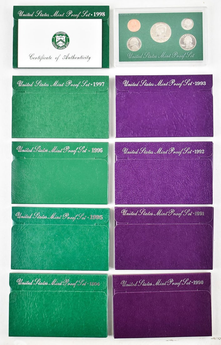 9 U.S. PROOF SETS FROM THE 1990s: An assortment of nine U.S. proof sets from the years 1990-1998. Each set comes in a hard plastic case and paper case measuring 3.5" H x 5.5" W x 0.4" D.