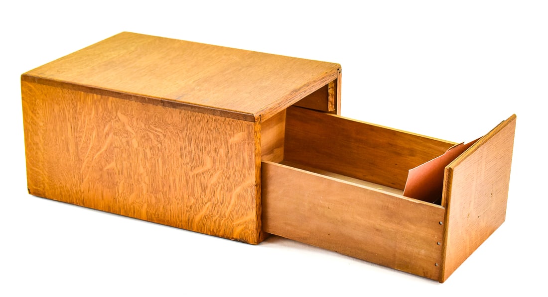 TABLETOP CARD CATALOG FILE BOX: The box is made of a quarter sawn oak wood and held together with dove joint sides. Stereotype cards fit in this box. There a single pull drawer. The box measures approximately 8" H x 10" W x 15" D.