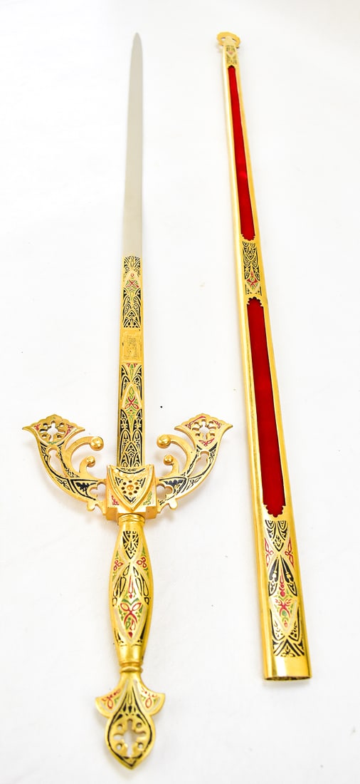 IMPERIAL CHARLES V REPLICA SWORD WITH METAL SHEATH, TOLEDO, SPAIN: An Imperial Charles V replica sword with gold plating and enameled designs featuring Moorish architecture and the Charles V double-headed eagle crest of Toledo, Spain. This full-sized sword comes with