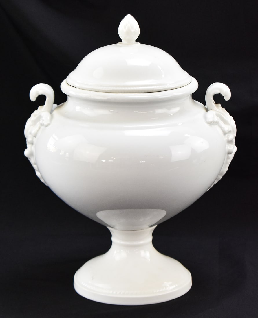 FRENCH IRONSTONE SOUPIERE: A French ironstone soupiere (soup tureen) with an artichoke finial, turn of the 19th century. The item measures approximately 13.5" H x 10.5" W x 9.5" D.