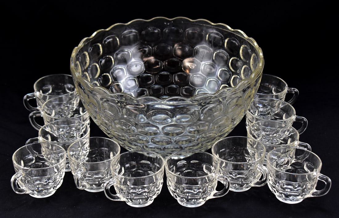"JUBILEE" PUNCH BOWL AND GLASSES, FEDERAL GLASS COMPANY: A "Jubilee" punch bowl and set of twelve matching glasses made by the Federal Glass Company in the mid-20th century. The punch bowl measures approximately 6.5" H x 12" W x 12" D.