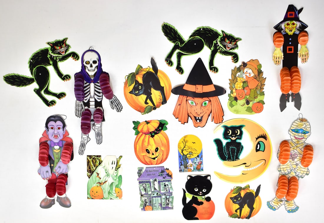 DIE CUT & CARDSTOCK HALLOWEEN DECORATION ASSORTMENT: This assortment has a total of 16 decorations. Six of them are jointed: two black cats, witch, mummy, vampire, and skeleton. All the pieces are from between 1960-1980. The largest decoration measures
