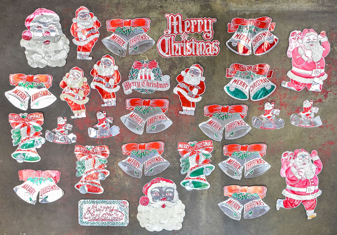 27 DIE-CUT FOIL CHRISTMAS ORNAMENTS: DOUBL-GLO, DENNISON: An assortment of twenty-seven die-cut foil Christmas ornaments, many made by Dennison and Doubl-Glo in the mid-20th century. The largest measures approximately 10.5" H x 9.5" W.
