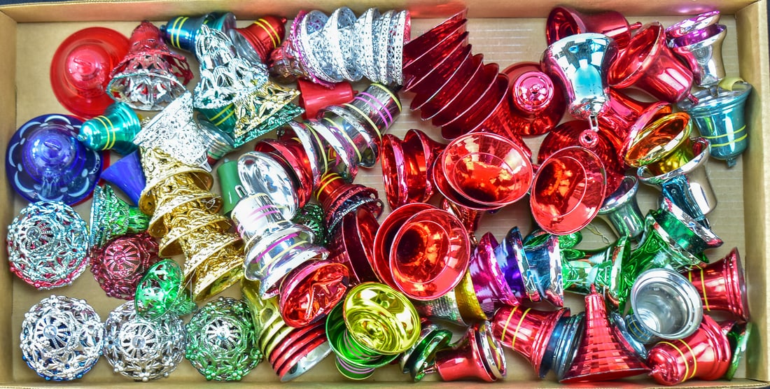 MID-CENTURY PLASTIC BELL ORNAMENT COLLECTION: A collection of Mid-century plastic bell shaped ornaments in assorted sizes and colors. The largest measures 3" H x 3" W x 3" D.