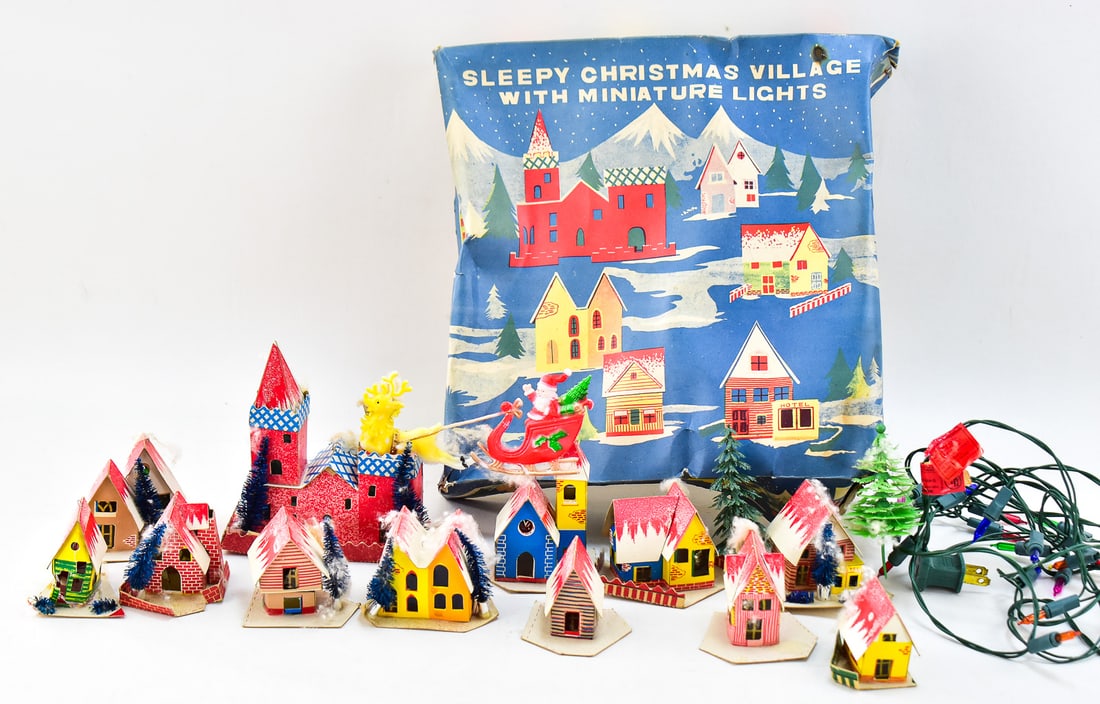MID-CENTURY SLEEPY CHRISTMAS VILLAGE WITH PUTZ HOUSES & LIGHTS: A boxed set of mid-century "Sleepy Christmas Village" which includes Putz houses and lights. The box measures 11" H x 11" W x 3" D.