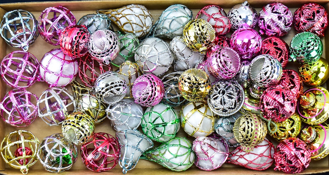 LARGE MID-CENTURY COLLECTION OF BRADFORD PLASTIC FILIGREE, CAGE & ANGEL HAIR ORNAMENTS: A large collection of mid-century Bradford plastic filigree, cage style and angel hair ornaments in assorted colors, shapes and sizes. The "teardrops" measure 5" H x 2.5" W x 2.5" D.