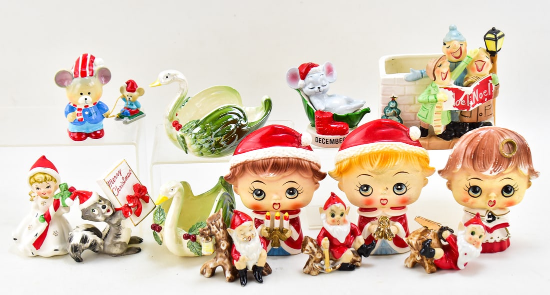 CERAMIC CHRISTMAS FIGURES COLLECTION: This lot has approximately 13 ceramic Christmas figures. Three of them at the 1950s Lipper & Mann "Big Head" Christmas carolers. Other item include three music instrument gnomes, a sleeping Decemb