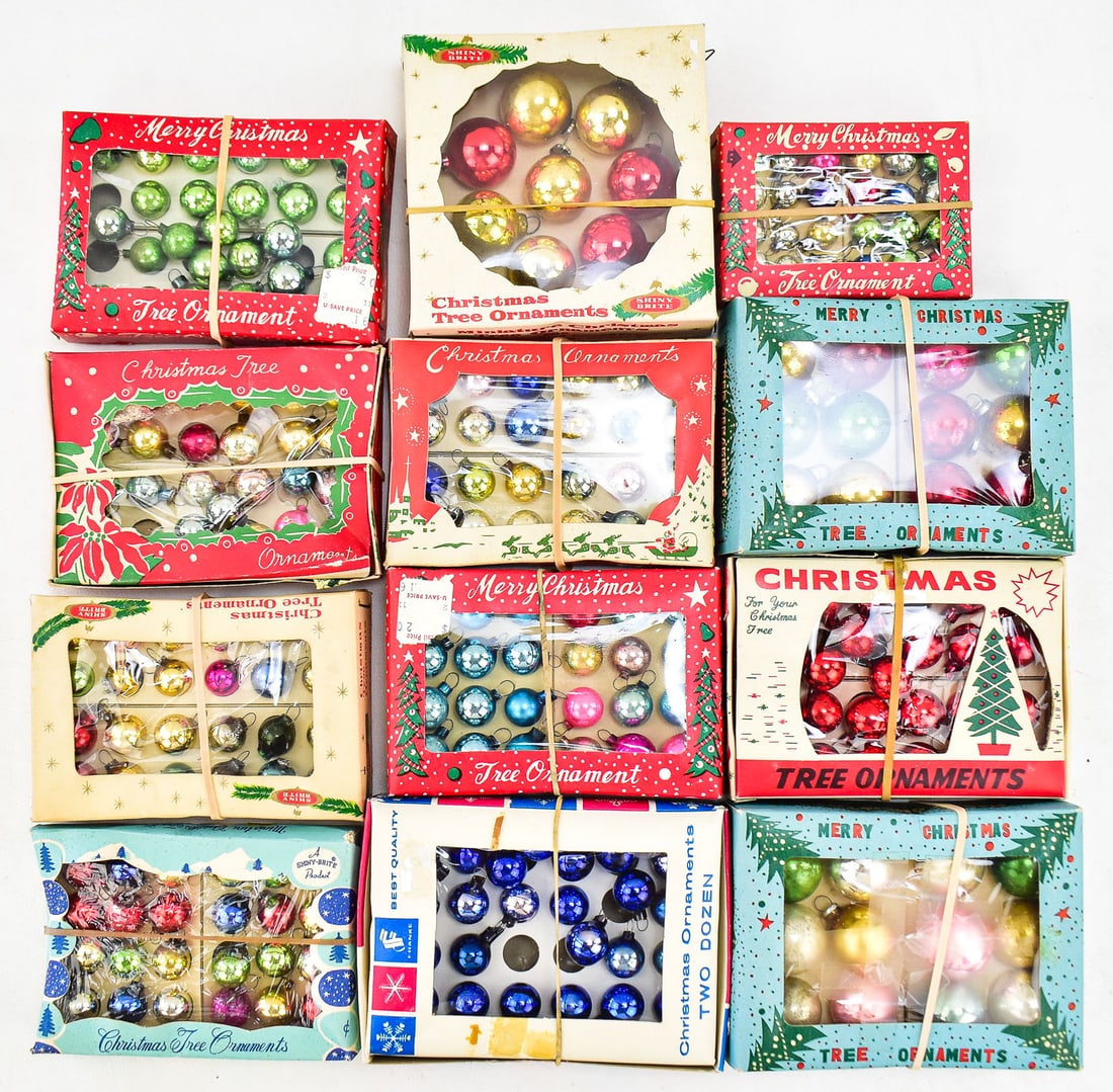 MINIATURE MERCURY GLASS BALL ORNAMENTS SHINY BRITE & MORE: Twelve boxes of vintage miniature glass and Mercury glass ball Christmas ornaments of assorted colors and sizes made by Shiny Brite, and other. The largest of the balls measures 1" H x 1 " W x 1" D.