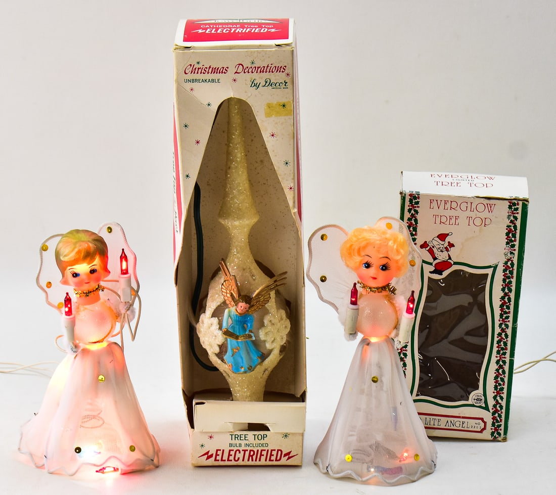 TRIO OF MID-CENTURY ELECTRIFIED ANGEL TREE TOPPERS: A trio of mid-century electrified angel tree toppers which includes two Everglow Lighted and one Jewel brite cathedral style measuring 11" H x 3" W x 3" D.