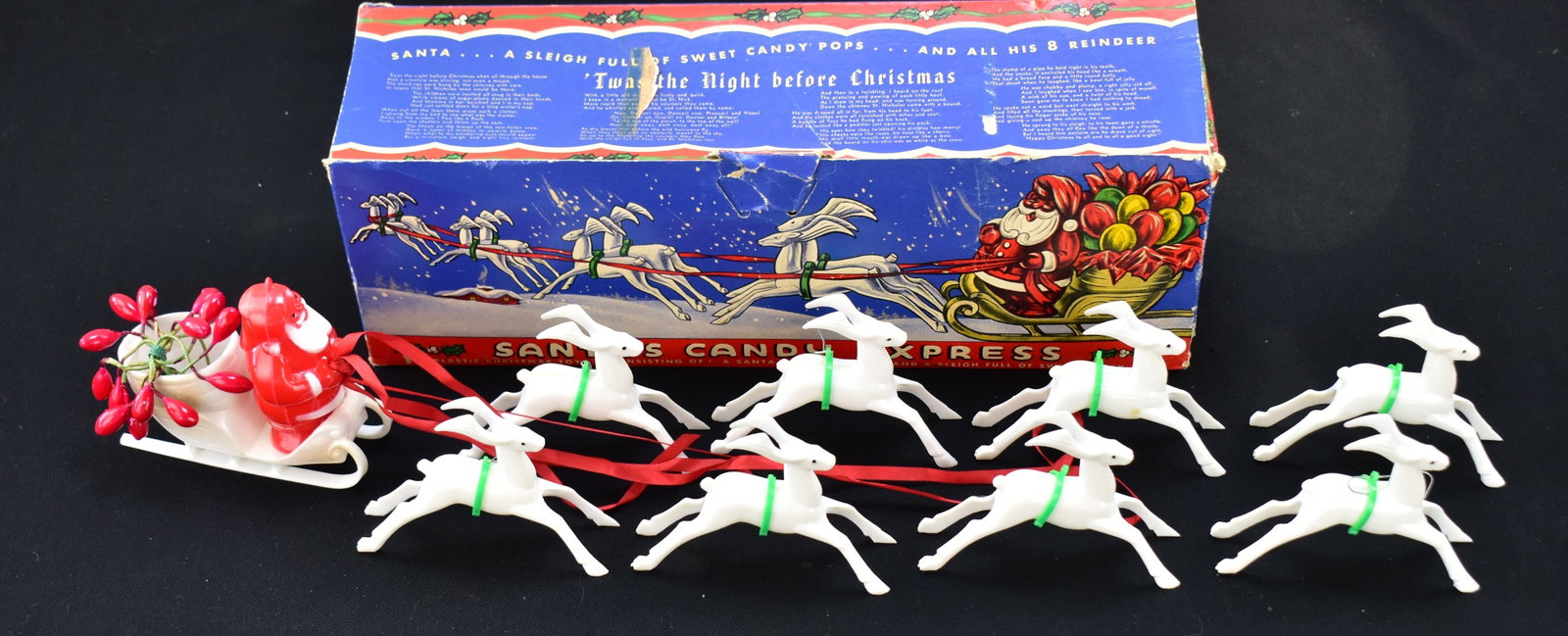 SEARS "SANTA'S CANDY EXPRESS" HOLIDAY SET: This set was produced by Rosbro Plastic Co in Pawtucket, Rhode Island and distributed by Sear in the 1940s-1950s. The box measures approx. 5.5" H x 15.5" W x 4.5" D.