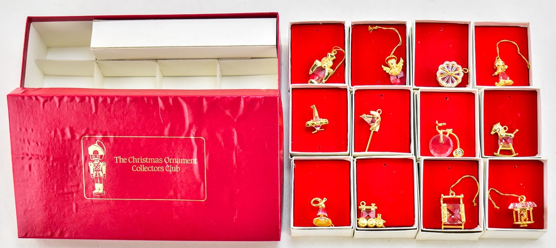 THE CHRISTMAS ORNAMENT COLLECTORS CLUB GLASS ORNAMENT SET: Vintage "The Christmas Ornament Collectors Club" glass ornament set with the box. The twelve assorted ornaments are glass with gold trim and measures approximately 1.5" H x 1" W x 1" D.