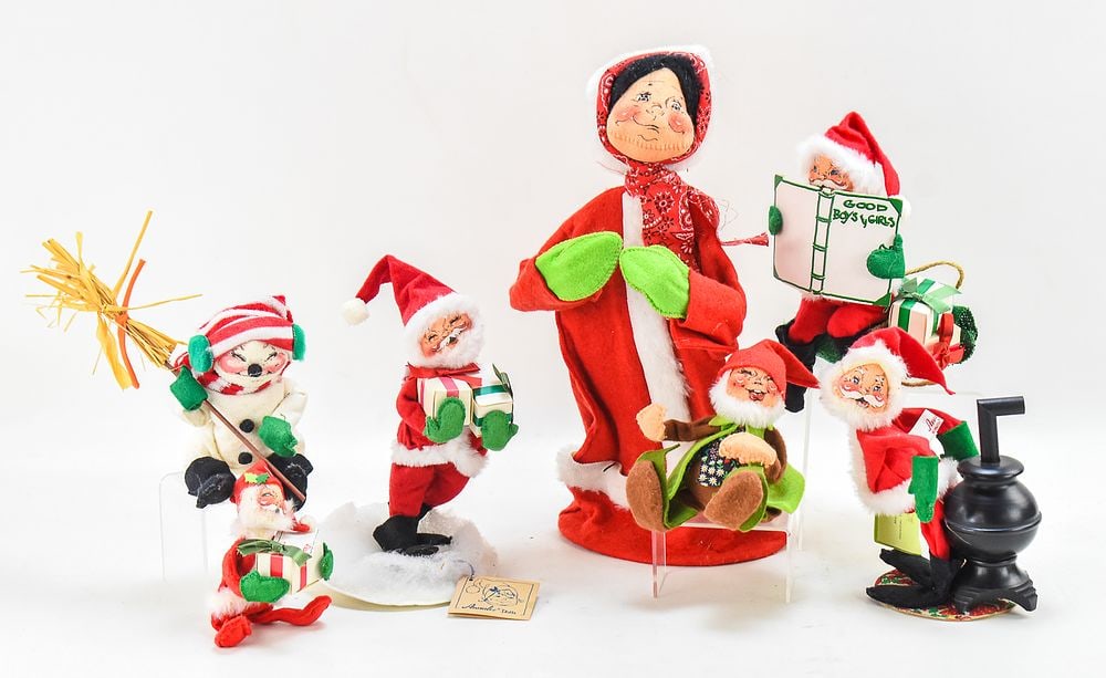 MID-CENTURY ANNALEE MOBILITEE CHRISTMAS DOLLS: Seven 1960s-70s Annelee mobilitee Christmas dolls. The largest "Christmas Caroler" measures approx. 14"H x 7"W x 6"D.