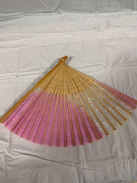 Japanese Fan: Pink and white cherry blossom Japanese style folding hand fan with a bamboo frame