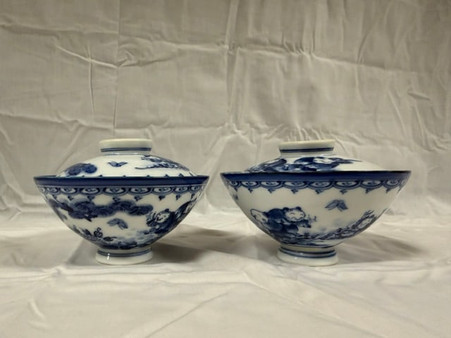 Japanese Porcelain: Pair of Japanese procelain style featuring the "Karako" motif, playing Chinese boys chasing butterflies or engaging in games