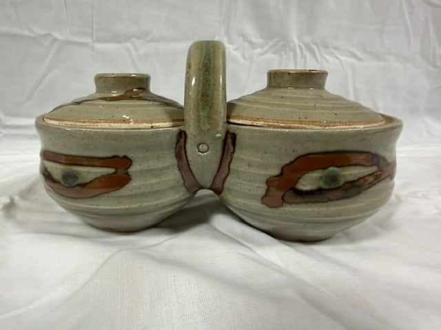 Stoneware Condiment: Stoneware double condiment server with handle, grey-green glaze with wax resist decoration