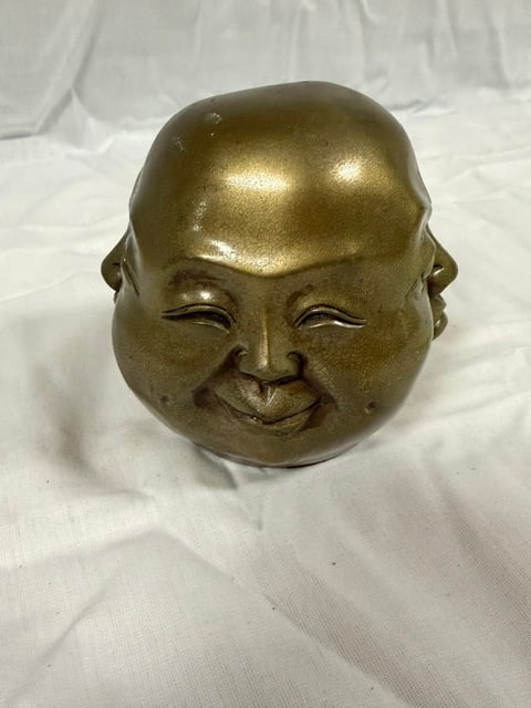 Brass Sculpture: Brass sculpture depicting a four-faced Buddha head: 3.5"H