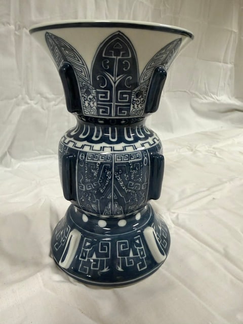 Japanese Vase: Porcelain blue and white gu-form vase with archaic bronze motifs; 7"X4.5" top