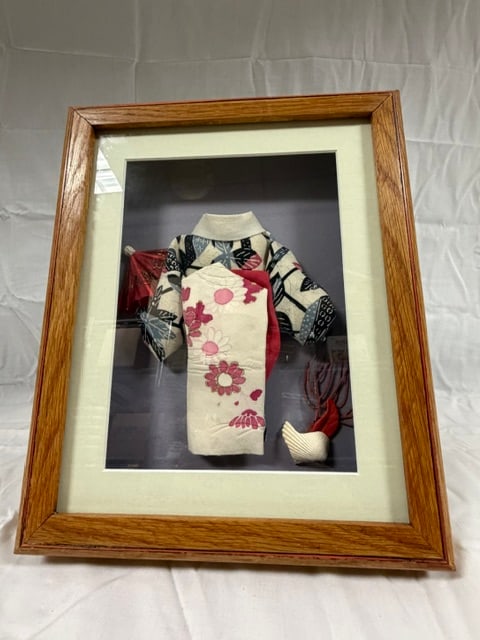 Framed Japanese Doll: Framed Japanese washi ningyo (paper doll) depicting a woman in traditional kimono; 8 3/4" X 10 3/4"