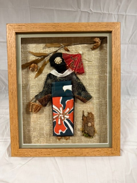 Japanese Samurai: Japanese oshie textile art depicting a samurai warrior figure in a shadow box frame; 9 3/4" X 11 3/4"