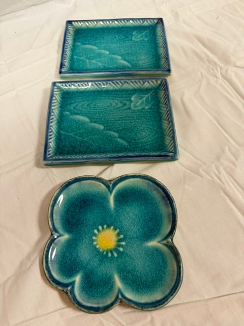 Ceramic Plates: Group of three (3) cewramic rectangular plate (2) and round with turquoise crackle glaze featuring embossed sea crature motifs/flower