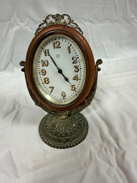 Swivel Desk Clock: Brass and metal (non working) swivel desk clock with ornate base