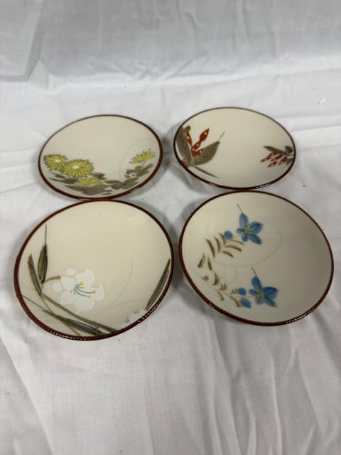 Ceramic Small Plates: Set of four ceramic small plates with hand-painted botanical motifs