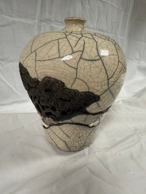 Ceramic Vase: Ceramic raku-fired vase with crackle glaze