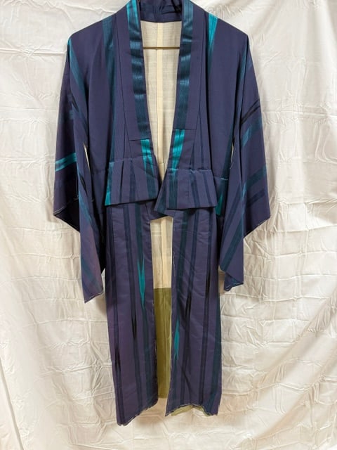 Japanese Kimono: Vintage Japanese silk kimono jacket with navy blue base and teal stripe