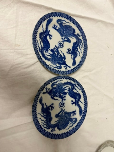 Porcelain Saucers: Pair of porcelain saucers with blue dragon motif by Maruta China, Occupied China