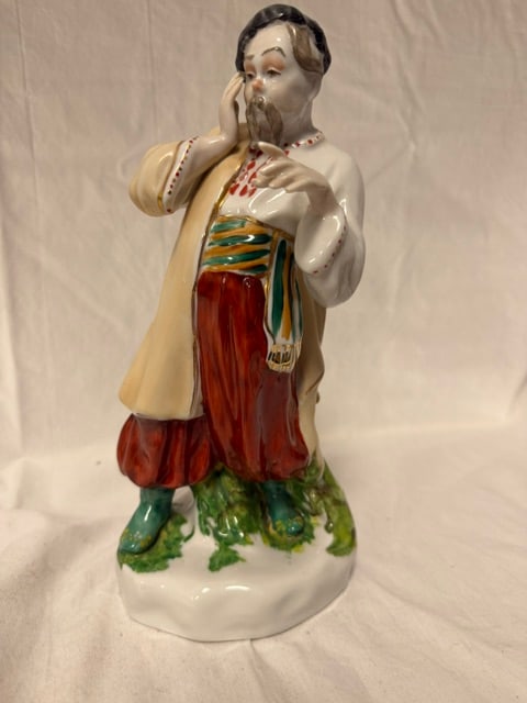 Porcelain Figurine: Porcelain figurine titled "Ukranian Folk Man" by Kieve Porcelain Factory